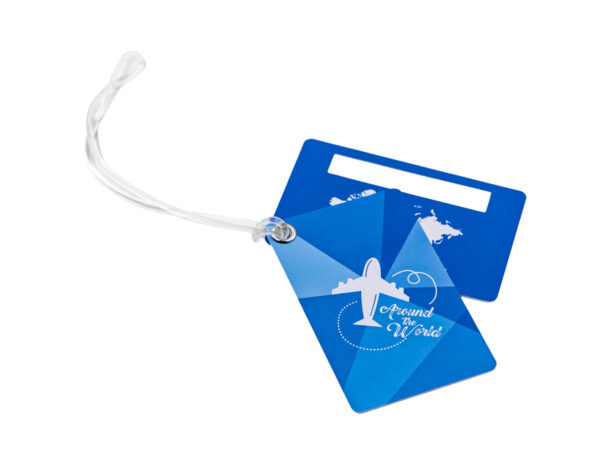 Personalized PVC Luggage Tag. Blue double luggage tag with airplane print and "Around the World" text. Travel ID attached with a clear loop. Corporate travel gadget. Manufacturer AMGS Group.