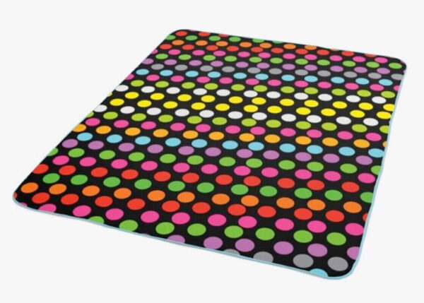 Colorful fleece blanket with sublimation printing. Featuring colorful polka dots, this blanket is warm and durable. One side is fully customizable. AMGS Group.