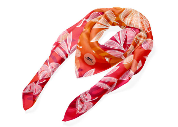 Personalized scarf with print and logo. In shades of red, lightweight and soft. The perfect promotional gadget, available at AMGS Group.
