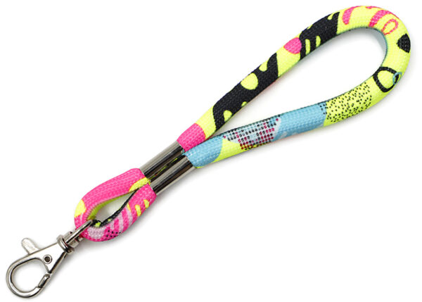 Short tubular keychain with metal carabiner, made of polyester strap with sublimation print from AMGS Group.