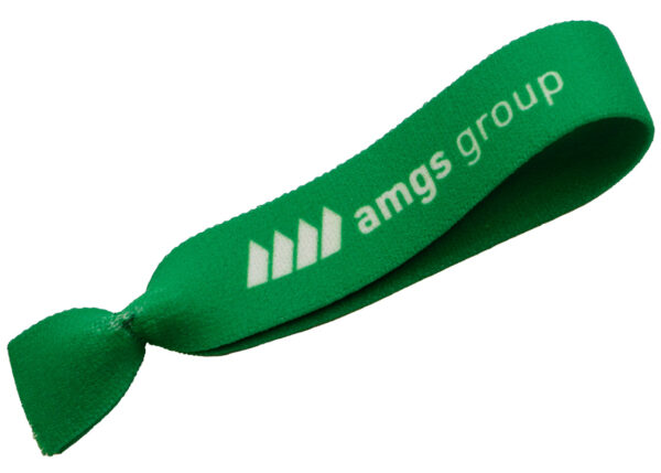 Custom Elastic Hair Ties. Green twistband-style hair tie and wristband with sublimation logo print.