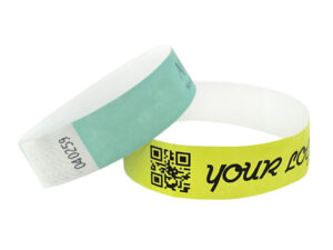 Custom Tyvek Wristband With Logo 19 mm. Customized Tyvek wristbands featuring a QR code and "your logo". Secure ticketing solution. Manufacturer AMGS Group.