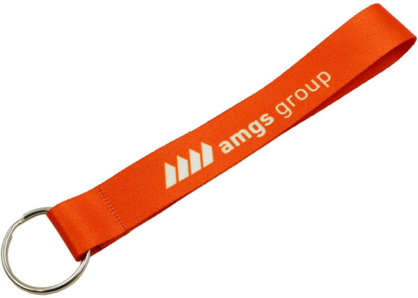 A short orange polyester keychain with a sublimation print and a metal keyring from AMGS Group.