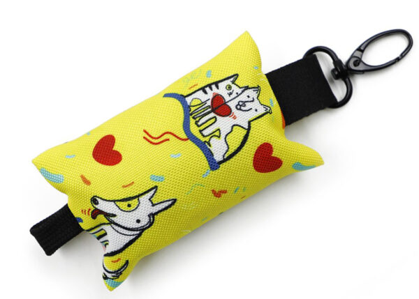 Detailed view of a colorful, customizable dog poop bag holder with fun cat patterns and a durable carabiner hook.