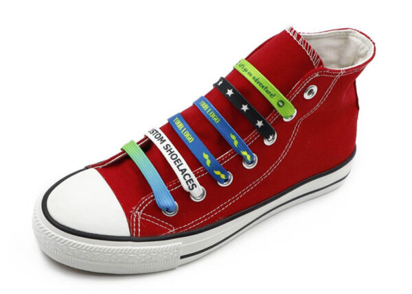 Red shoe with multicolor flat branded shoelaces with sublimation logos. From AMGS Group.