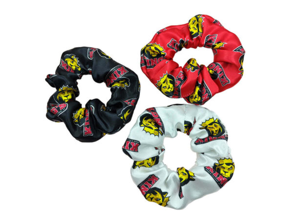 AMGS Group set of three satin scrunchies (black, red, white) with team logo — ideal sports merchandise; contact us for pricing.